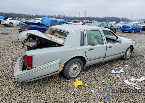 2000 Lincoln Town Car Executive z USA, uszkodzony, nr VIN 1L1FM81W9YY804792